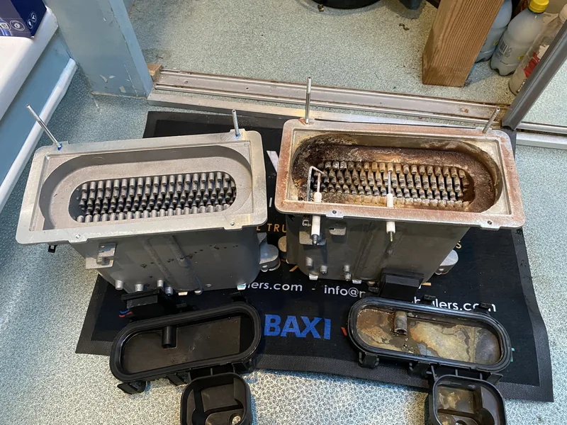 Boiler heat exchanger clean versus clogged with sludge